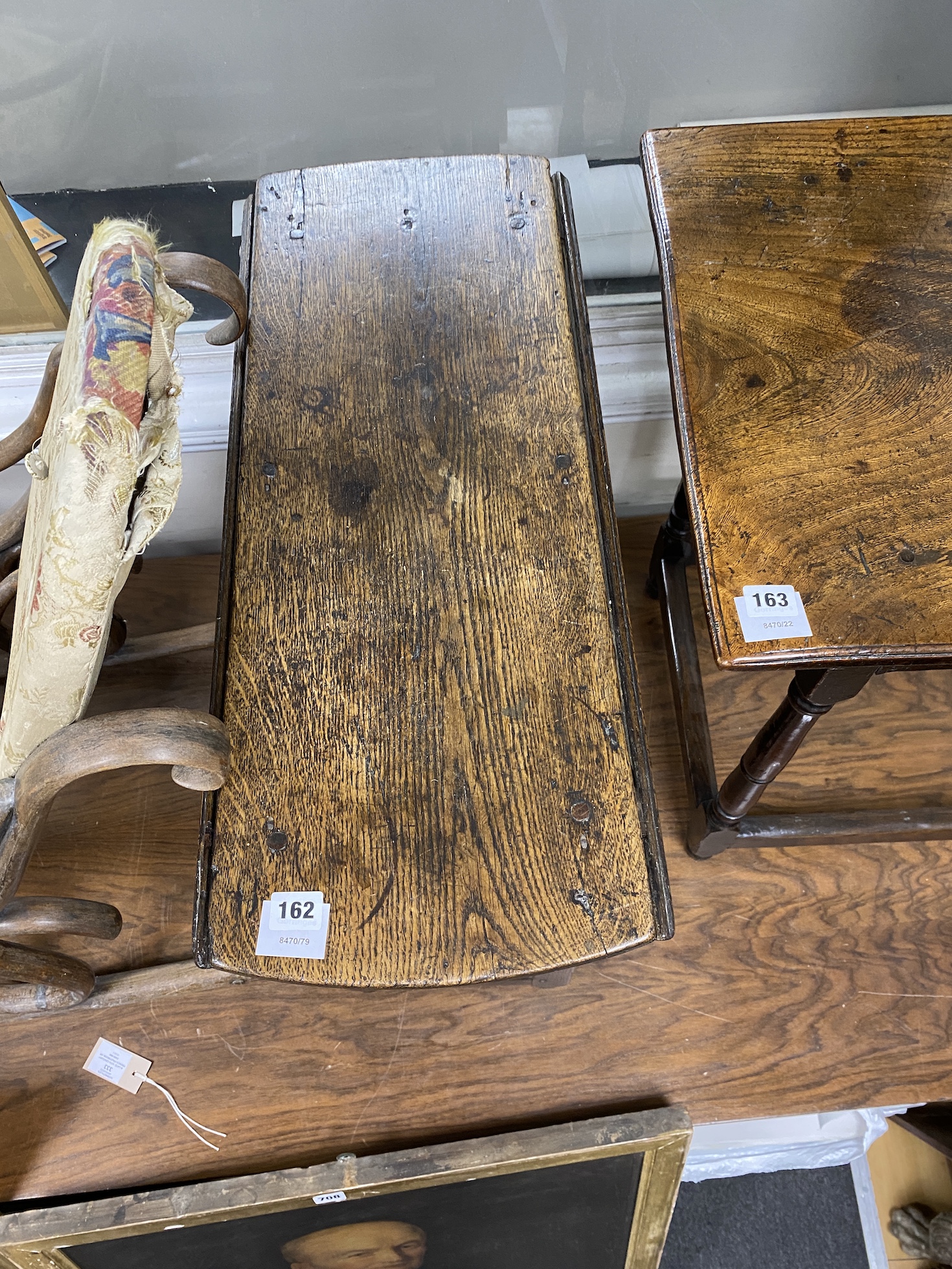 A Charles II and later oak small oval gateleg table, with a drawer, square and column turned legs joined by stretchers, width 72cm, depth 29cm, height 60cm